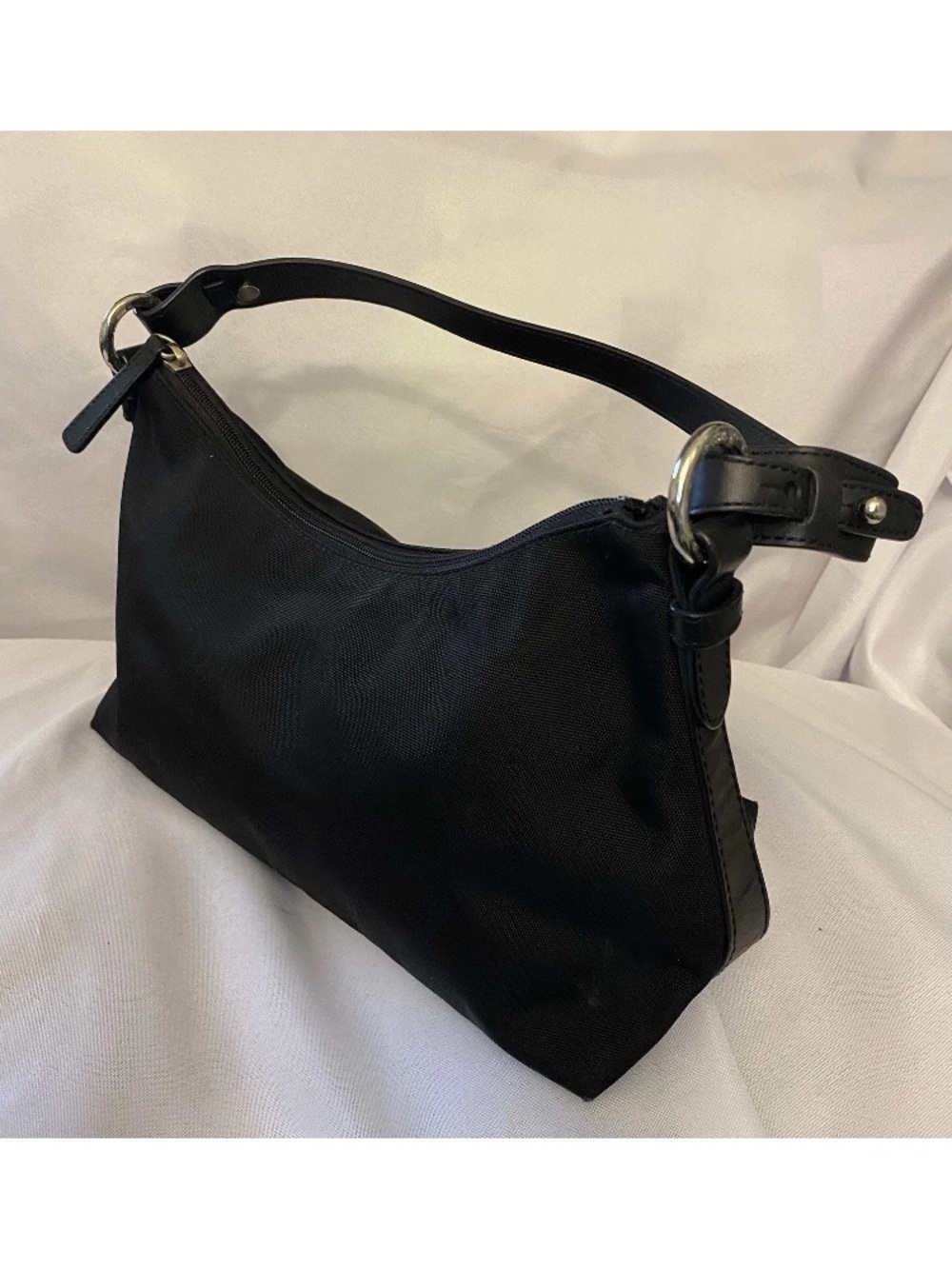 Sleek Black Shoulder Bag with Silver Ring Detail